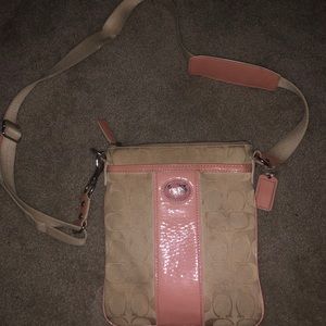 Pink and beige Coach crossbody purse